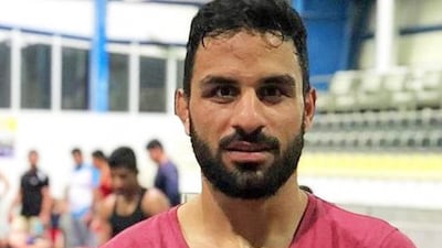 Iranian champion wrestler Navid Afkari was executed this year for his role in the 2018 protests. EPA