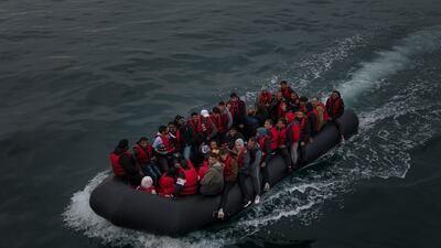 A boat carrying about 50 migrants illegally crosses the English Channel en route to Britain. Getty
