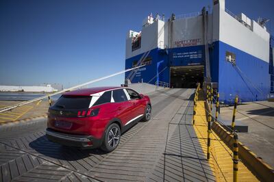 A new red right hand drive Peugeot 3008 4x4 before export to Sheerness, UK, at the Port of Zeebrugge.