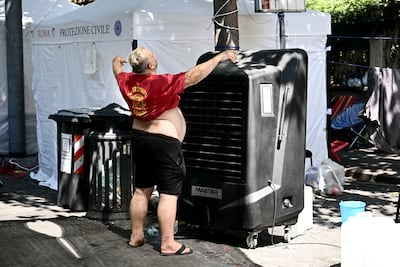 A man cools off in Rome, where temperatures are expected to hit 37°C. AFP
