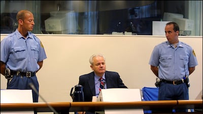 Slobodan Milosevic appears for the second time before the Yugoslav war crimes tribunal in August 2001 in The Hague. Getty Images