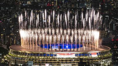 Fireworks light up the sky over the Olympic Stadium during the closing ceremony of the Tokyo 2020 Olympic Games.