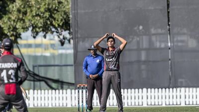 Aryan Lakra bowling for UAE U19s against Scotland at the ICC Academy in Dubai Sports City in January 2020. Antonie Robertson / The National