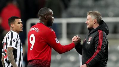 Ole Gunnar Solskjaer shakes hands with Romelu Lukaku at the end of the match. Reuters