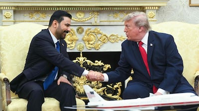 Ali Al Zaidi, Prime Minister of Iraq, shakes hands with US President Donald Trump in the Oval Office of the White House, Washington. AFP