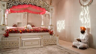 A shrine where the Sikh holy book is placed upstairs in the main prayer hall. Khushnum Bhandari / The National