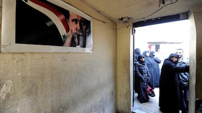A poster of Syria's Bashar Al Assad is seen inside a military police station in Aleppo. Nothing better illustrates the decline of the laws of war than the devastating civil war in Syria. Omar Sanadiki / Reuters