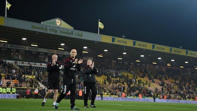 Alex Neil, manager of Norwich City, applauds the fans after his side were relegated during the Premier League match against Watford at Carrow Road on May 11, 2016 in Norwich, England. Ross Kinnaird/Getty Images