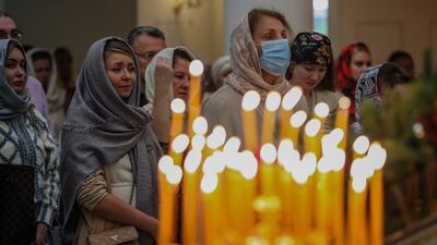 Worshippers celebrate Orthodox Christmas.
