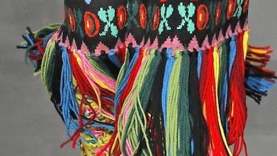 A model wears socks with sandals on the autumn winter 2017 Gucci runway