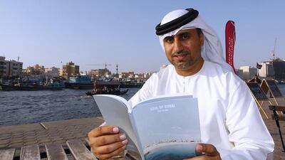 Khalil Abdulwahid, visual arts manager at Dubai Culture’s projects and events department, stresses that the Soul of Dubai, is a guide book not just for tourists but also residents who want to better know the city. Jeffrey E Biteng / The National