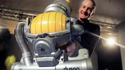 Inventor James Dyson demonstrates his latest hoovering invention in 2005. Getty Images