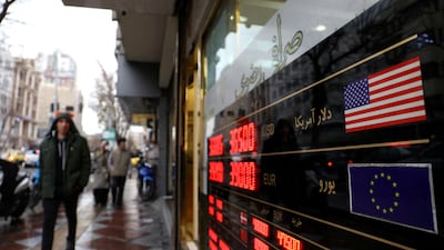 A board shows currency exchange rates in Tehran, Iran. Reuters
