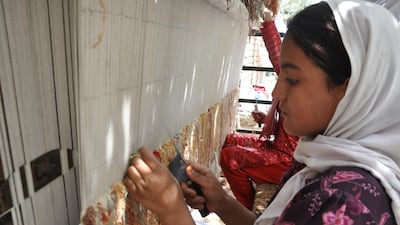 According to an FBMI brochure, more than 10,000 carpets have been produced, more 3,000 people are employed, and in excess of 7,000 children are receiving education Courtesy FBMI