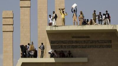 Supporters of Ahmed Ali Abdullah Saleh, the son of former Yemeni President Ali Abdullah Saleh, gather at the Monument of the Unknown Soldier during a demonstration demanding presidential elections be held and the younger Saleh run for the office, in Sanaa, Yemen. Hani Mohammed / AP Photo