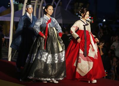 Models present South Korean traditional dresses called Hanbok by designer Lee Yoon-Sook during the Seoul Story Fashion Show. EPA