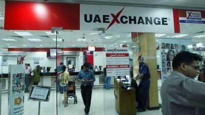 Business at UAE Exchange in Karama yesterday. Diwali and other festivals, coupled with the depreciating value of Indian rupees, have inspired more UAE residents to send money home to the subcontinent.