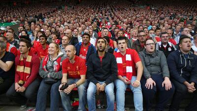 LIVERPOOL, ENGLAND - AUGUST 17: Fans on the kop during the Barclays Premier League match between Liverpool and Stoke City at Anfield on August 17, 2013 in Liverpool, England. (Photo by Clive Brunskill/Getty Images)