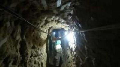 Essam Suleiman works on a new 25-meter deep tunnel that will run under the border to Egypt to bring through goods to Gaza.