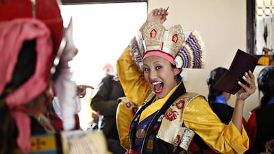 A Tibetan girl smiles as she gets ready for a performance to mark “Losar” or the Tibetan New Year in Kathmandu, Nepal. Navesh Chitrakar / Reuters