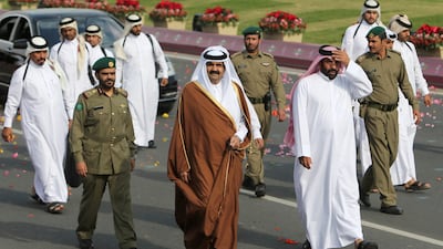 Sheikh Hamad arrives to attend Qatari National Day celebrations in Doha, in December 2012. Reuters