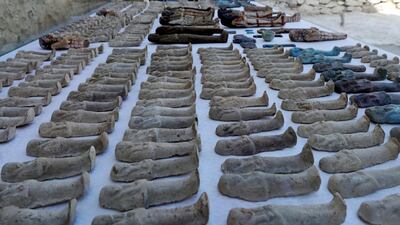 Statuettes are arranged in rows. Reuters