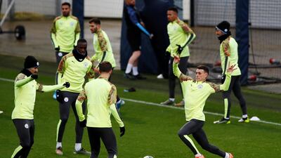 Manchester City's Phil Foden and teammates train in Manchester. Reuters