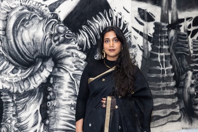 Tooba Shahbaz Shaikh with her work Holding Or comprises. Photo: NYUAD