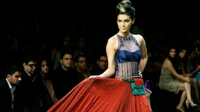 August 18, 2011: An Indian model displays designer Anita Dongre creations during the Lakme Fashion Week. AP Photo/Rajanish Kakade