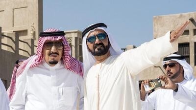 Saudi King Salman bin Abdulaziz, left, listens to Sheikh Mohammed bin Rashid, Vice President and Ruler of Dubai, during his visit to Dubai. Saudi Royal Palace / AFP Photo