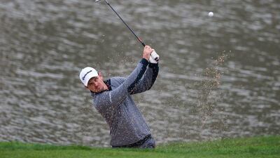 Justin Rose of England plays a shot out of a bunker during the BMW Shanghai Masters tournament on Friday at Lake Malaren Golf Club in China. Johannes Eisele / AFP / November 13, 2015