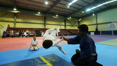 Teacher John Sugumar Ratnam with beginners at an Aikido class in Dubai. Satish Kumar / The National