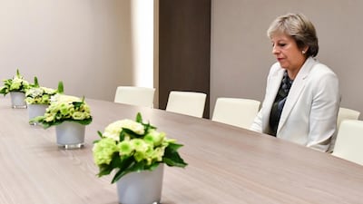 Theresa May waits for the arrival of European Council President Donald Tusk prior to a bilateral meeting in Brussels. AP Photo