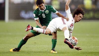 UAE’s Mohammed Alraqi (R) fights for the ball with Yahia Al-Shehri (L) player of Saudi Arabia during the FIFA World Cup 2018 Asian qualifying Group A soccer match between UAE and Saudi Arabia at Mohammed Bin Zayed Stadium- Aljazira Club in Abu Dhabi, United Arab Emirates on 29 March 2016. EPA/ALI HAIDER