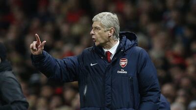 Arsenal's manager Arsene Wenger will look for his side to rebound against Manchester United on Wednesday. Sang Tan / AP