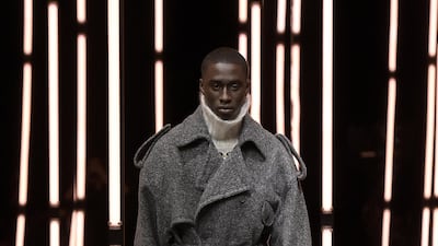 Fendi offers an oversized, high necked jacket, loosely tied at the waist for autumn / winter 2021. Courtesy Fendi