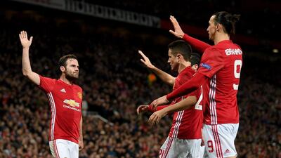 Juan Mata, left, scored the only goal of the Europa League last 16 second leg against Rostov on Thursday to send Manchester United through to the quarter-finals. Ross Kinnaird / Getty Images