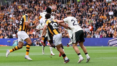 Hull striker Oliver McBurnie heads for goal. Getty Images