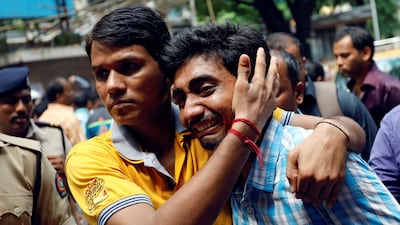 A relative of a stampede victim grieves at a hospital in Mumbai, India. Danish Siddiqui / Reuters