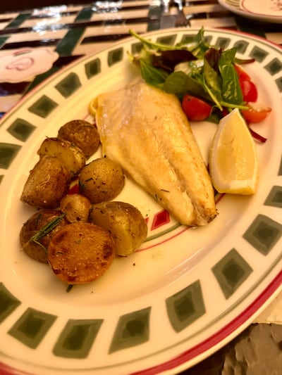 Rock salt-baked sea bass fillet with roasted potatoes. Photo: Gemma White