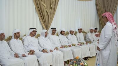 Sheikh Mohammed bin Zayed, Crown Prince of Abu Dhabi and Deputy Supreme Commander of the Armed Forces, third left, and Major General Sheikh Khaled bin Mohamed bin Zayed, Chairman of the State Security Department, fifth left, offer condolences to the family of martyr Mohammed Al Humoodi who died while serving with the Armed Forces in ‘Operation Restoring Hope’. Mohammed Al Hammadi / Crown Prince Court - Abu Dhabi