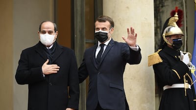 French President Emmanuel Macron welcomes his Egyptian counterpart Abdel Fattah El Sisi at the Elysee presidential Palace in Paris. AFP