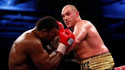 Tyson Fury, right, of England fights Dereck Chisora of England in the eliminator for the WBO World Heavyweight Championship during Boxing at ExCel on November 29, 2014 in London, England. (Photo by Julian Finney/Getty Images)