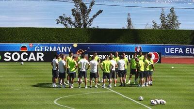 Joachim Low, head coach of Germany talks to his players prior to a Germany training session ahead of their Uefa Euro 2016 semi-final against France at Ermitage Evian on July 06, 2016 in Evian-les-Bains, France. Alexander Hassenstein / Getty Images