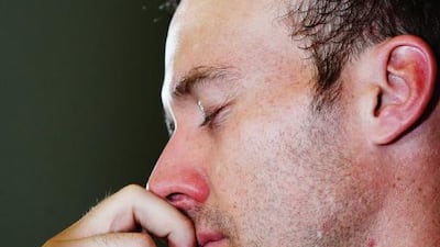 AB de Villiers of South Africa takes a moment to compose himself during the news conference after to New Zealand in Auckland, New Zealand, on March 24, 2015. Hannah Peters / Getty Images