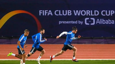 Real Madrid training session at the NYU Abu Dhabi football stadium,right, Gareth Bale doing sprints at the sidelines during the practice session.