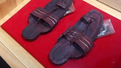 Smugglers have packed pills into the under side of sandals, as this exhibit at the Dubai Police Museum shows. Chris Whiteoak / The National