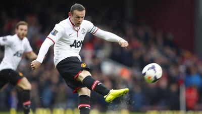 Wayne Rooney of Manchester United scores a goal during a match between West Ham and Man U. Rooney now earns £300,000 a week Tal Cohen / EPA
