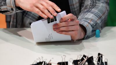 Paper ballots are counted at a by-election in England last month. The Electoral Commission has been targeted by a cyber-attack. Getty