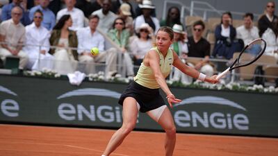 Maja Chwalinska hits a return against Mirra Andreeva. AFP